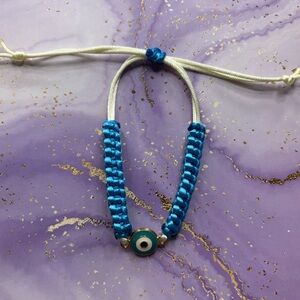 Handmade nylon satin adjustable bracelet with evil eye charm